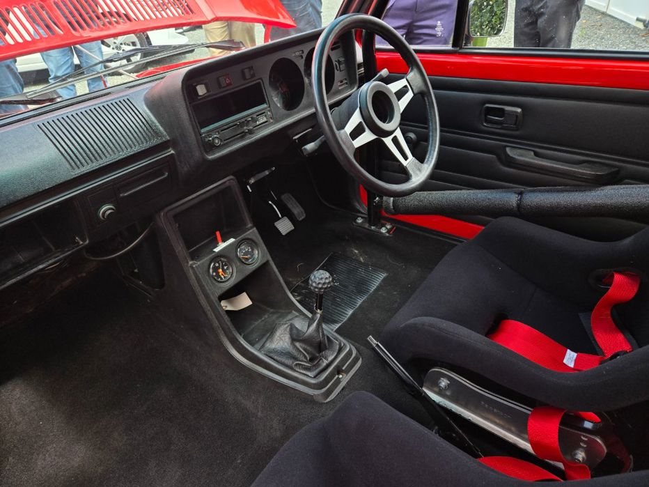 Volkswagen Golf driven by Denny Hulme and Stirling Moss.