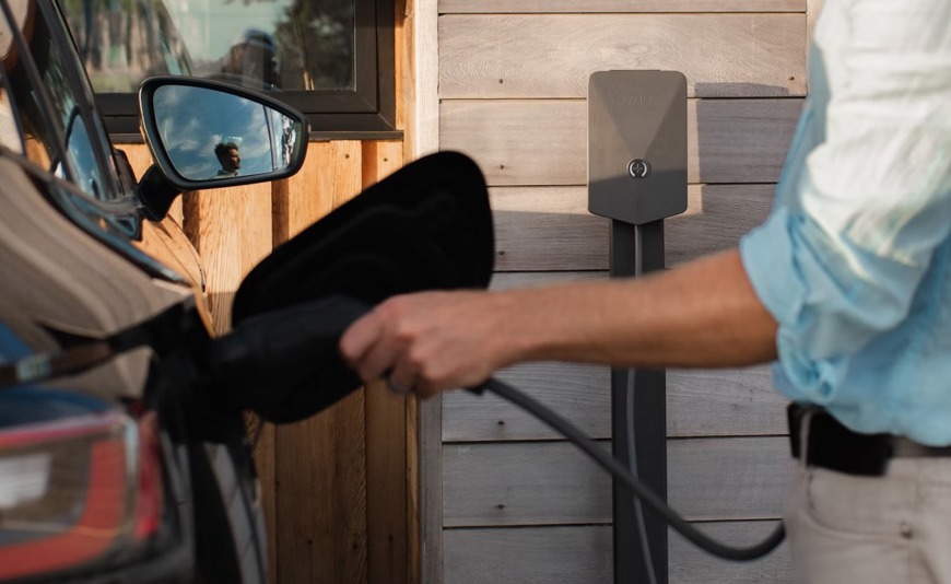 Man charging EV
