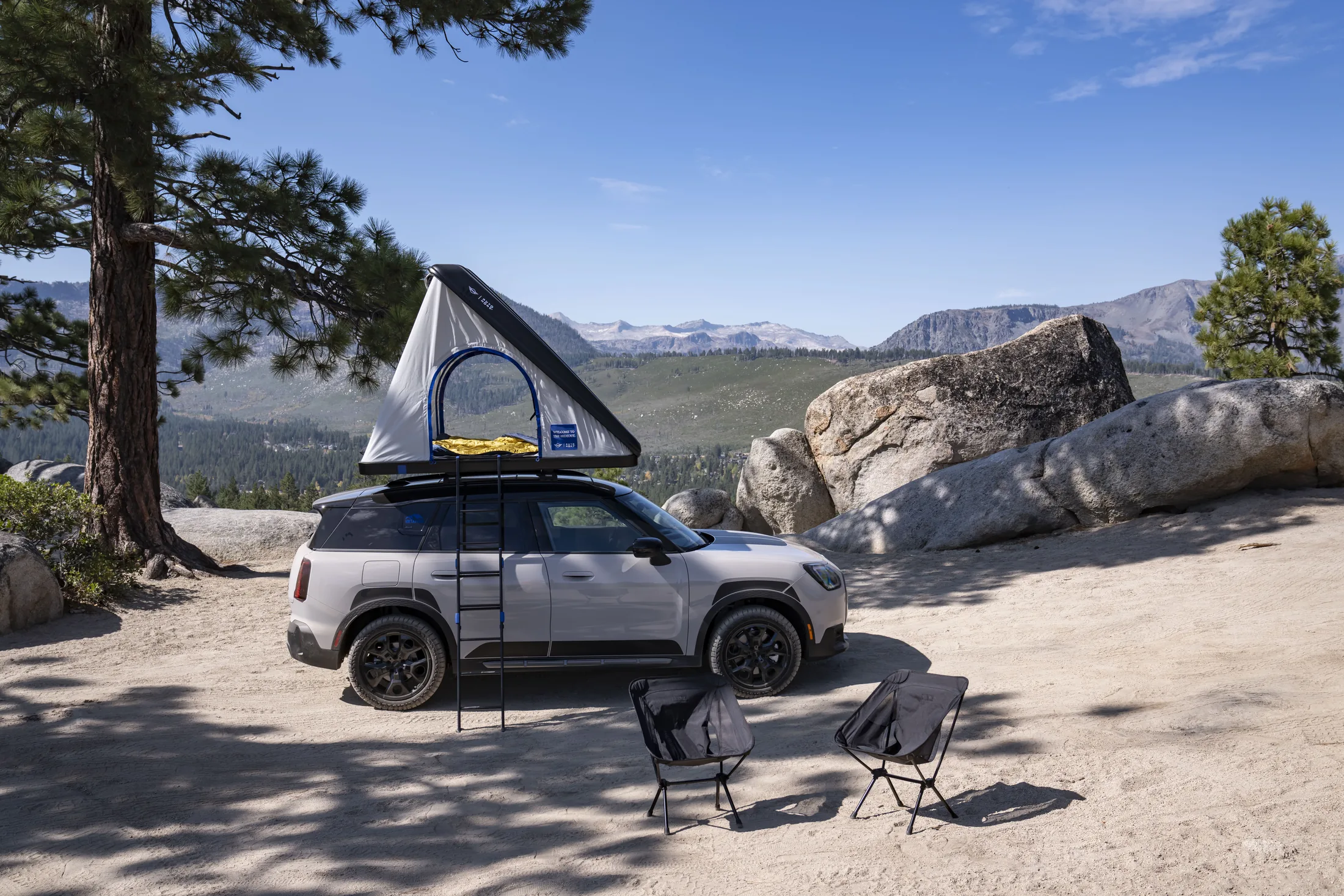 Exact Untamed on-location exterior, tyre, cabin or roof-tent scene.