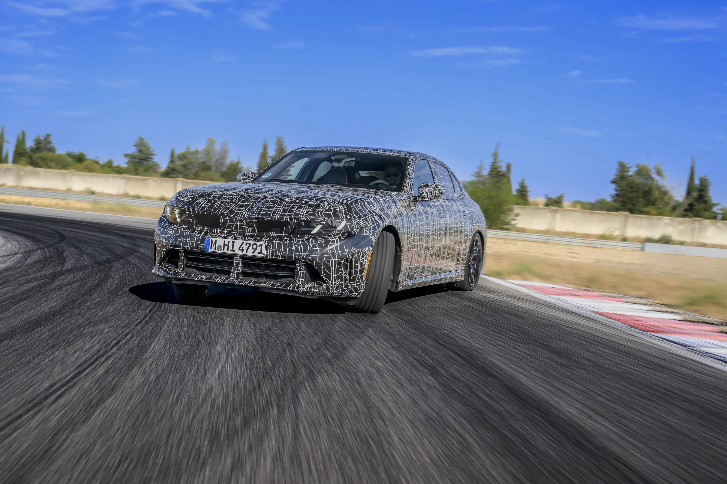 BMW 3 Series test car on a wet Miramas track