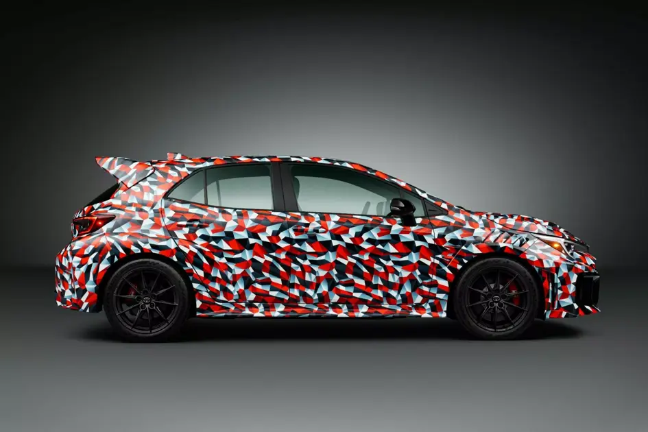 Prototype shows vents, wing, and revised chassis tuning.